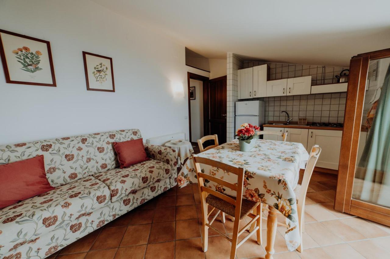 Aparthotel Residenza Golfo Degli Ulivi à Caprioli Extérieur photo