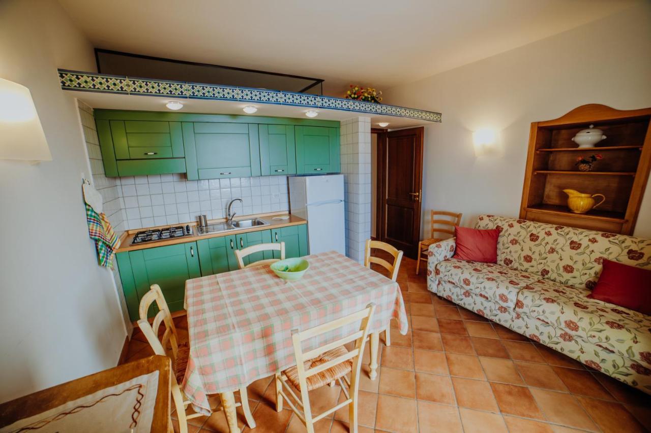Aparthotel Residenza Golfo Degli Ulivi à Caprioli Extérieur photo
