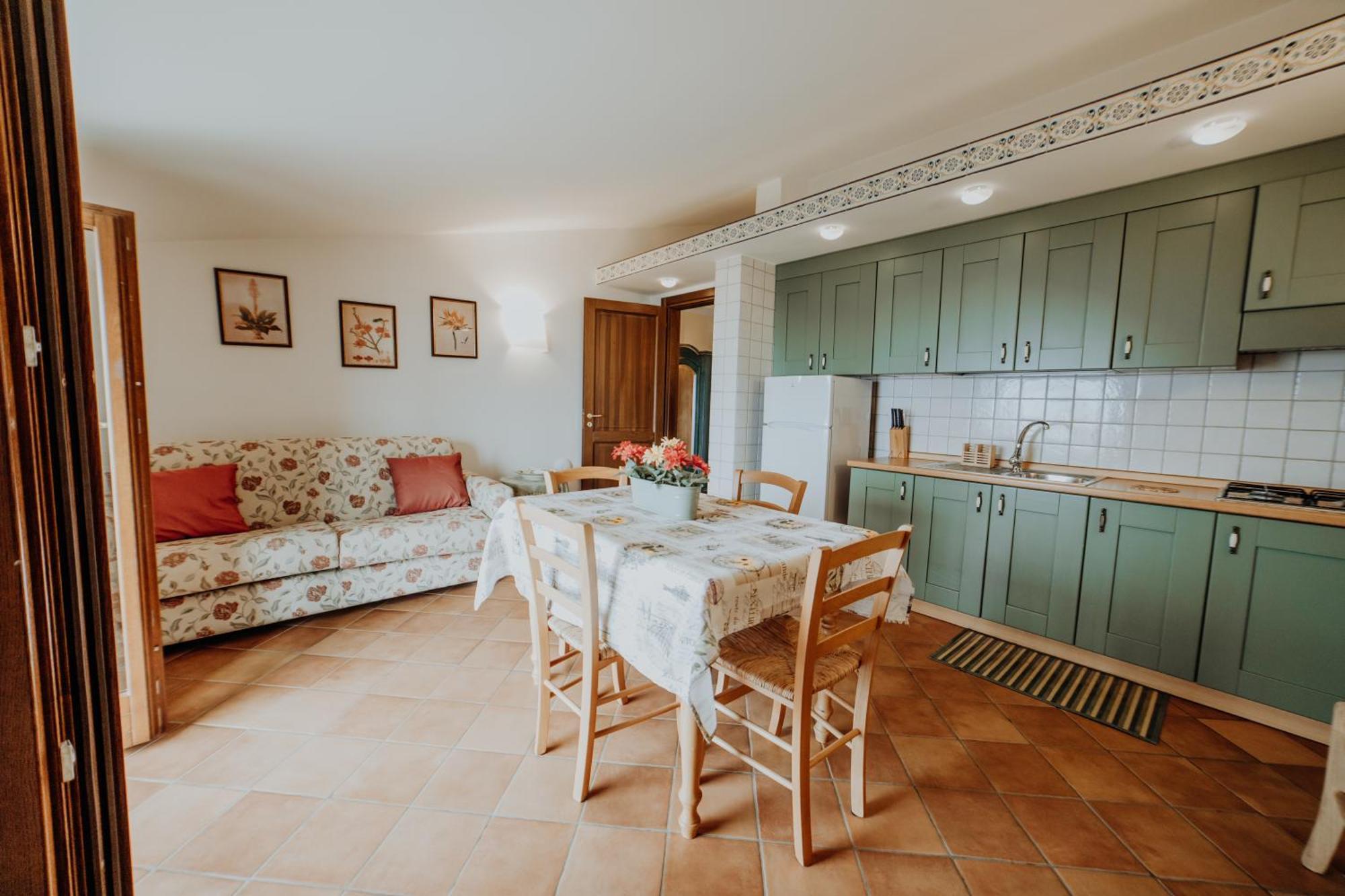 Aparthotel Residenza Golfo Degli Ulivi à Caprioli Extérieur photo