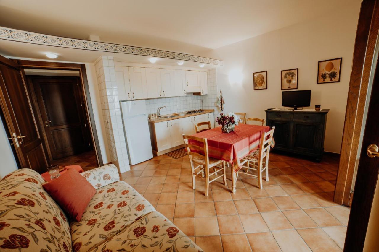 Aparthotel Residenza Golfo Degli Ulivi à Caprioli Extérieur photo
