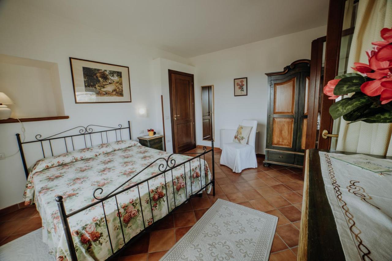 Aparthotel Residenza Golfo Degli Ulivi à Caprioli Extérieur photo