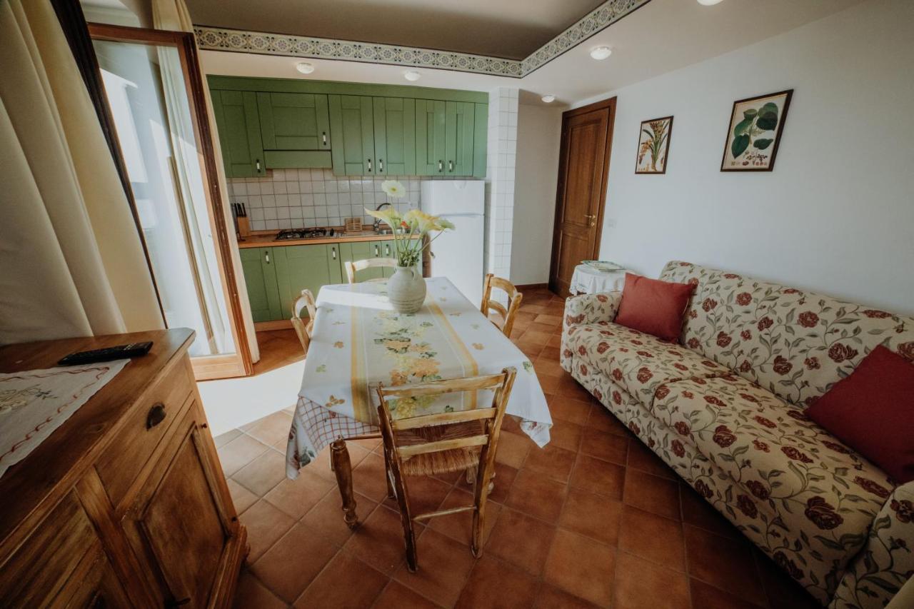 Aparthotel Residenza Golfo Degli Ulivi à Caprioli Extérieur photo