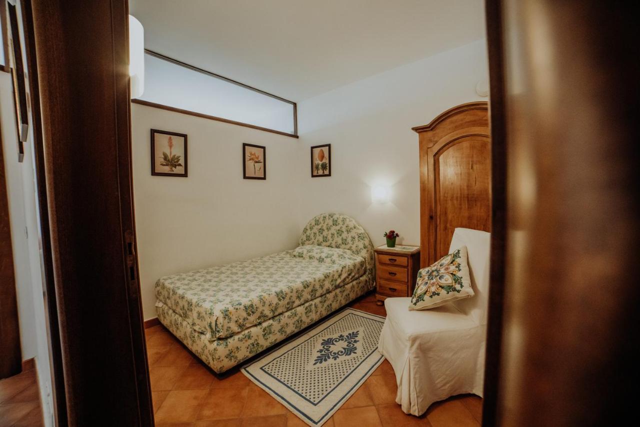 Aparthotel Residenza Golfo Degli Ulivi à Caprioli Extérieur photo