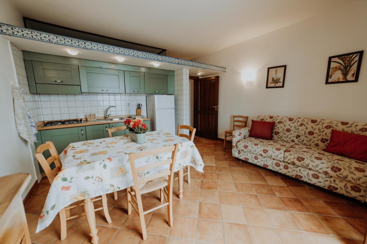 Aparthotel Residenza Golfo Degli Ulivi à Caprioli Extérieur photo