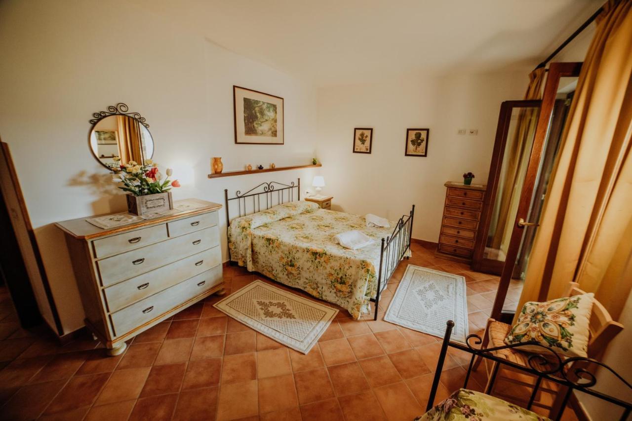 Aparthotel Residenza Golfo Degli Ulivi à Caprioli Extérieur photo